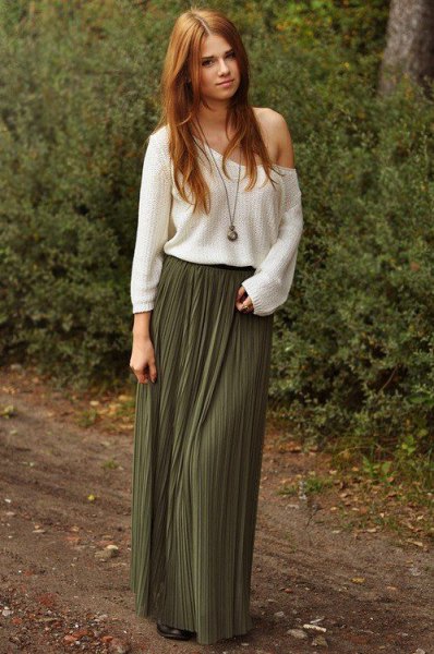 white shoulder sweater with pleated floor length skirt