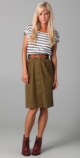 black and white striped t-shirt with high waisted olive knee length skirt