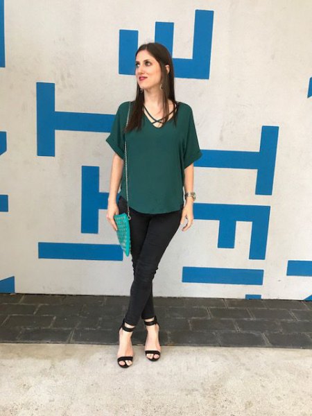 green short-sleeved chiffon blouse with black chinos