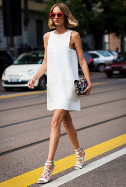 white sleeveless dress with matching open toe flaps