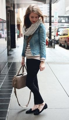blue denim jacket with striped sweater and black chinos