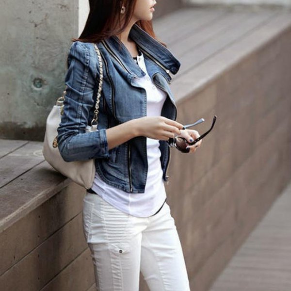 blue puff shoulder denim jacket and white moto jeans