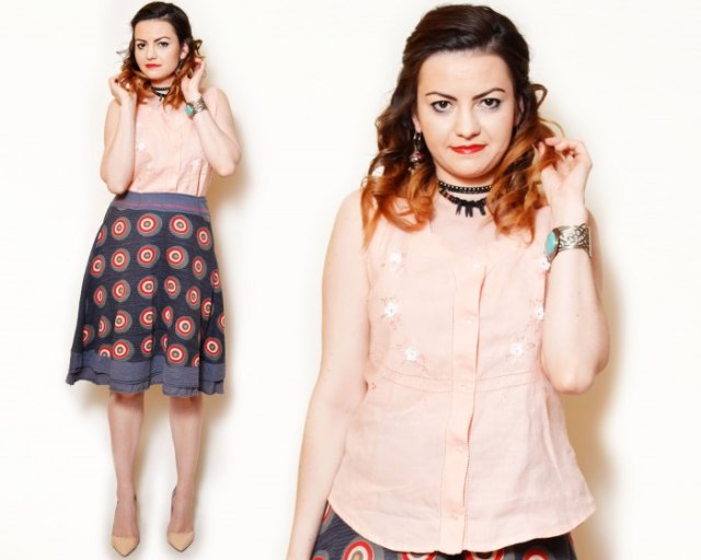 bright peach flowers with embroidered sleeveless shirt with navy printed skirt
