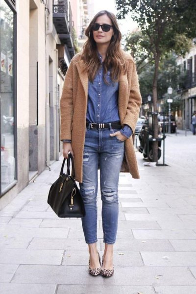 camel wool long jacket with blue comrade shirt and ripped jeans