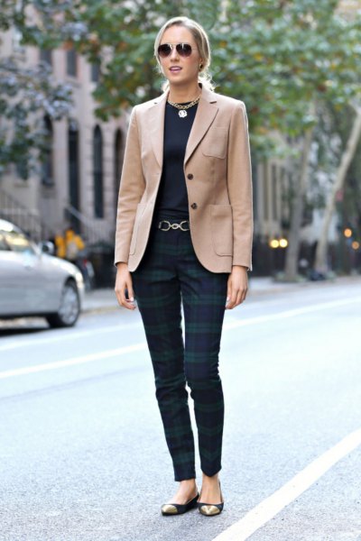 camel blazer with black tee and navy gray plaid trousers