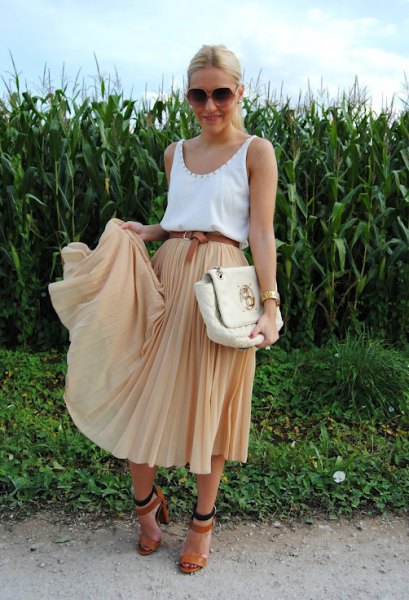 white scoop neck top with blush midi pleated skirt