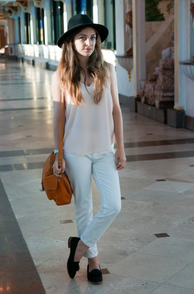 white v-long long top with matching chinos and felt hat