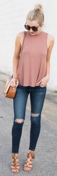 pink pink mock neck top with dark blue ripped jeans