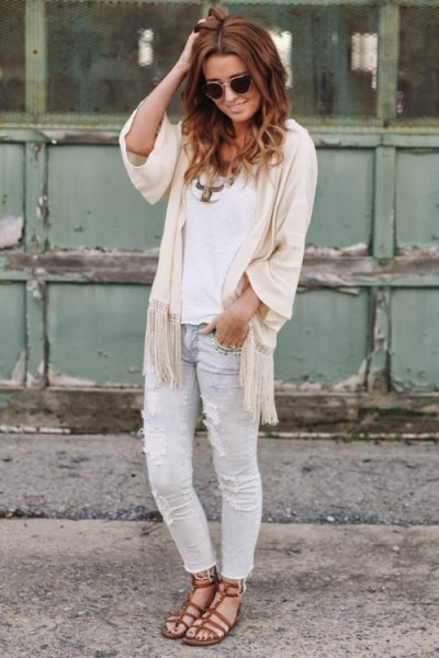white top with ivory in half sleeve and in light gray jeans