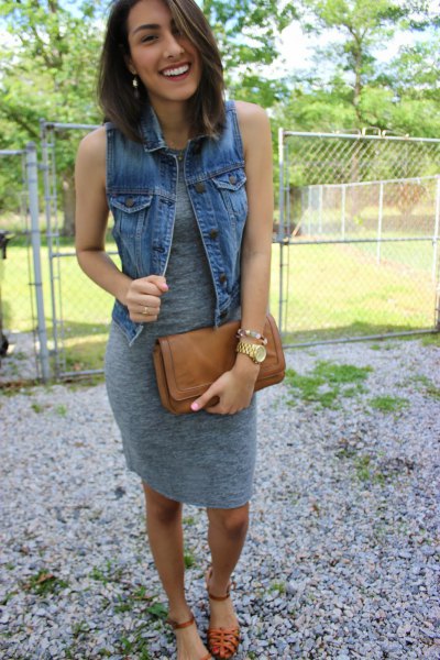 gray knee length sleeveless dress with blue denim vest