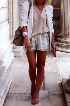 white blazer with pink blouse and shiny shorts