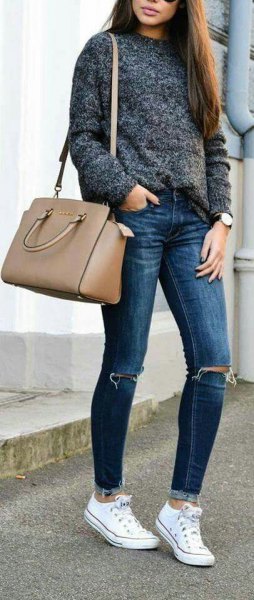 Heather gray sweater with blue jeans and pink handbag