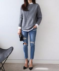 gray knitted sweater with white button up shirt and ripped skinny jeans