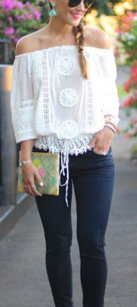 white crochet lace from shoulder top with slim jeans