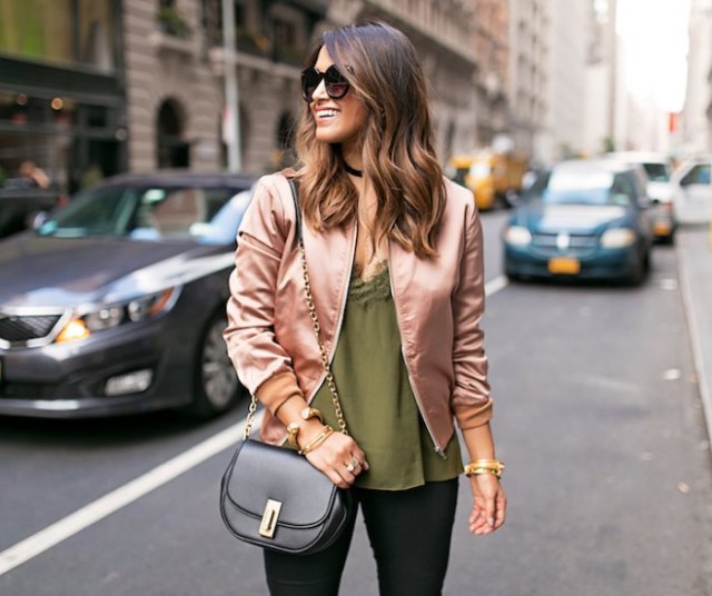 pink gold bomber jacket with green deep v-neck top