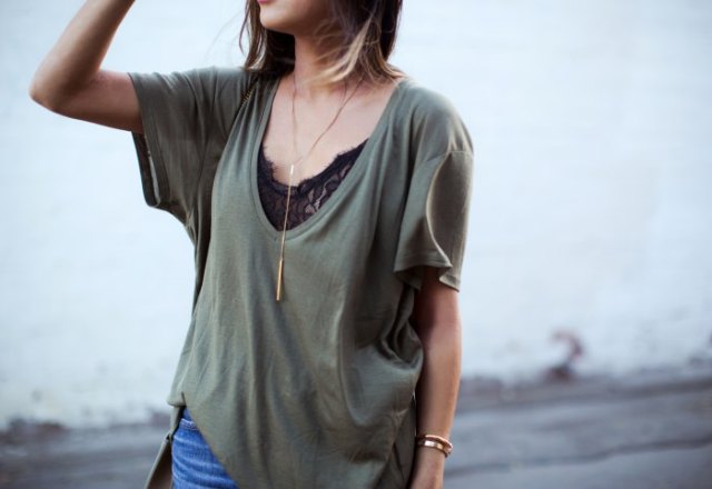 gray oversized low cut t-shirt over black lace top