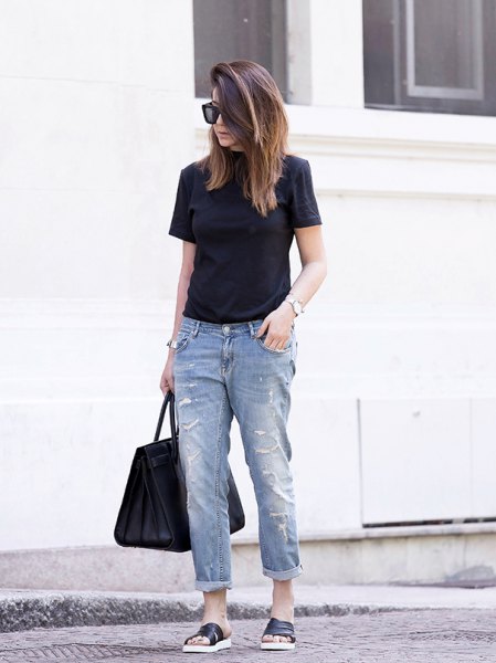 black t-shirt with cuffed boyfriend jeans and slide sandals