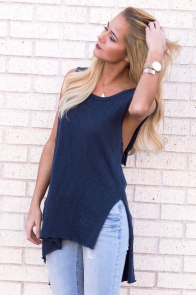 navy blue cutout top with light blue jeans