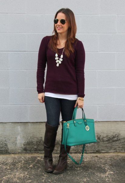 deep purple sweater with white statement necklace