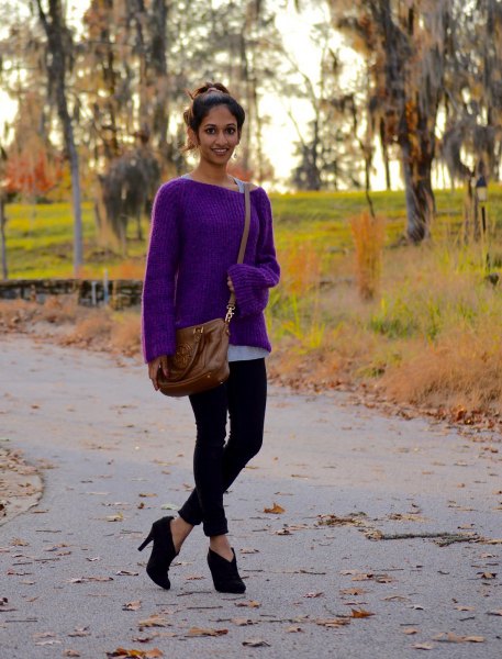 purple boat neck sweater with black cropped slim jeans