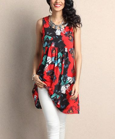 red and black floral printed tunic with white skinny jeans