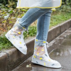white half pure rubber snow and rain boots with jeans and tee