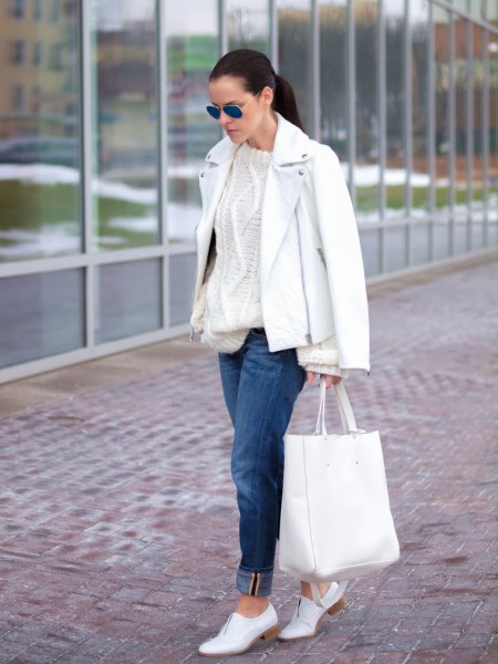 leather jacket with knitted sweater and white shoes