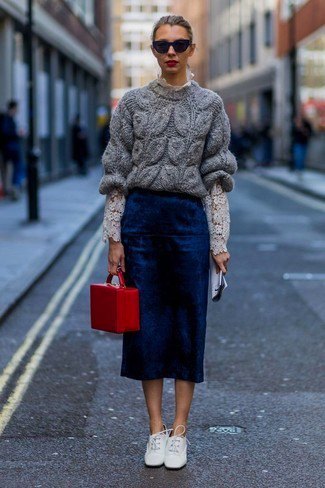 gray chunky sweater with navy midi skirt and white leather shoes