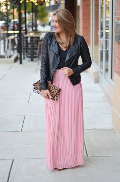 black leather jacket with pink pleated maxi skirt
