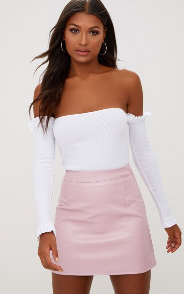 light pink skirt with white tube top and separated long sleeves