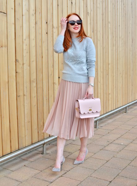 gray sweater with mock neck with pink pleated skirt