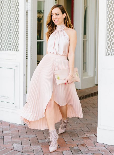 pink silk halter top with asymmetrical blush maxi pleated skirt