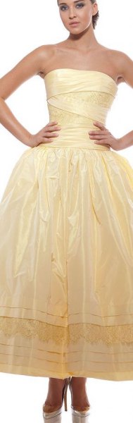 yellow strapless fit and shiny shiny maxi-prom dress