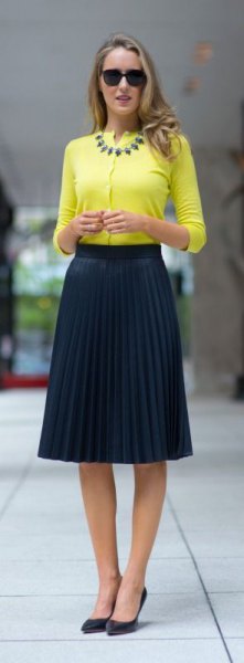 yellow half sleeve no collar blouse with pleated midi navy blue skirt