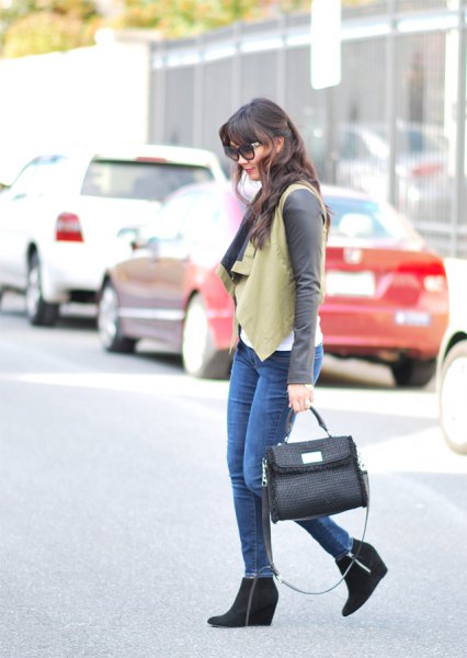 crepe vest with gray long-sleeved tee and black ankle boots