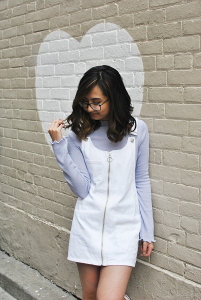 lavender sweater with white overall mini dress