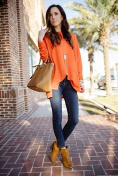 dark orange leather boots with chiffon blouse and jeans