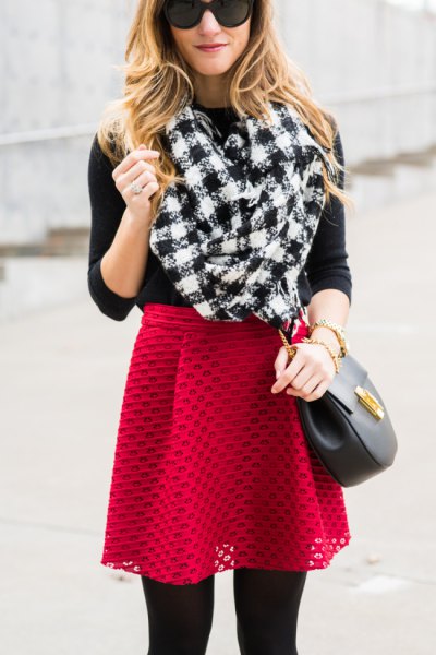 black and white checkered scarf with red semi-clean skirt
