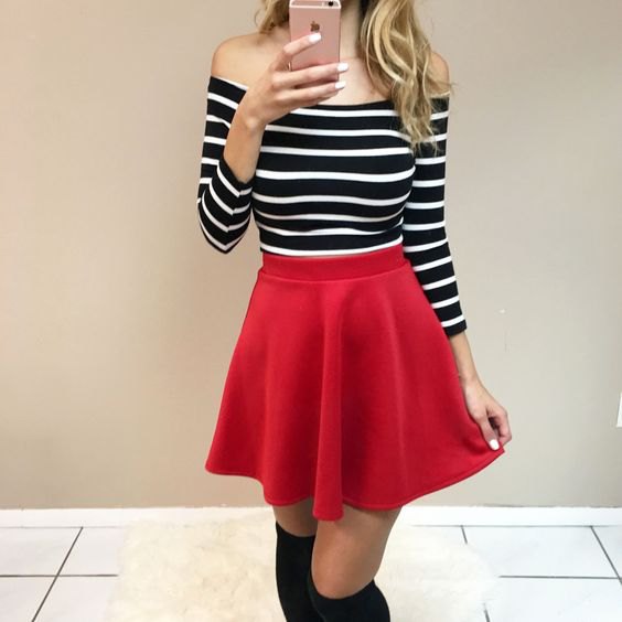 from the shoulder black and white striped top with long sleeve with red skater skirt