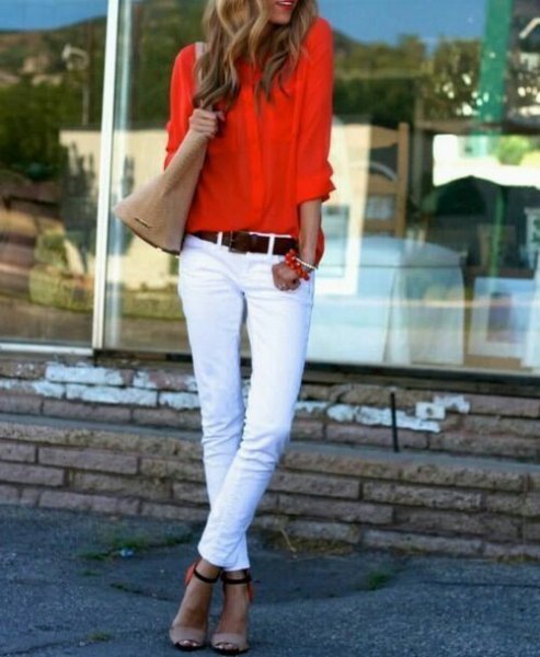 orange shirt with white skinny jeans