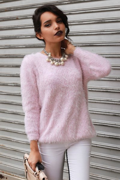 light pink fuzzy sweater with white skinny jeans