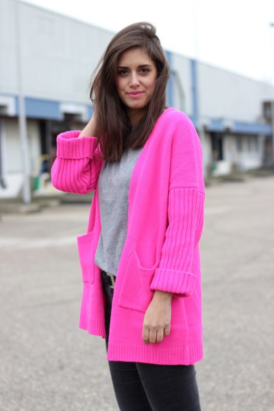 warm pink sweater cardigan with gray sweater and black jeans