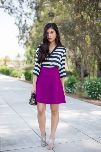 black and white horizontal striped top with purple skirt
