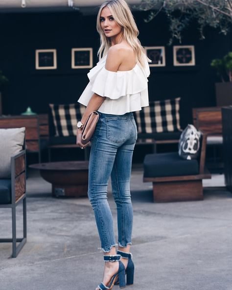 a shoulder blouse with cropped slim jeans and denim heels