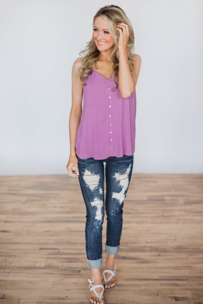 purple button up vest with ripped skinny jeans