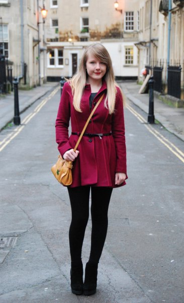 burgundy coat with long fur with leggings and ankle boots