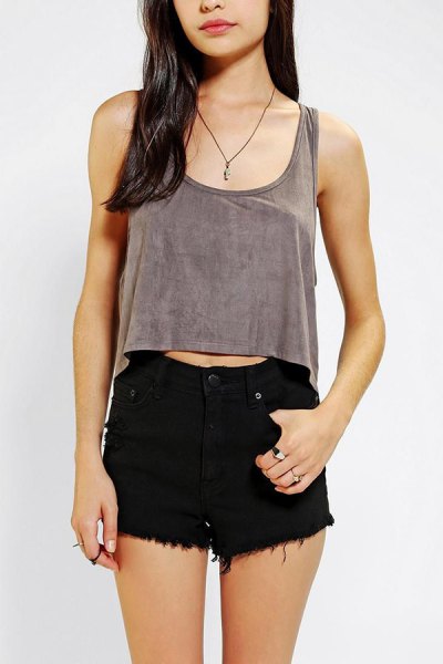 gray cropped vest top with black denim mini shorts