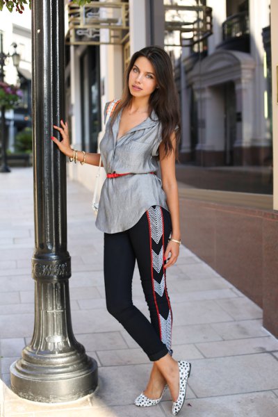 silver sleeveless belt blouse with black cropped pants