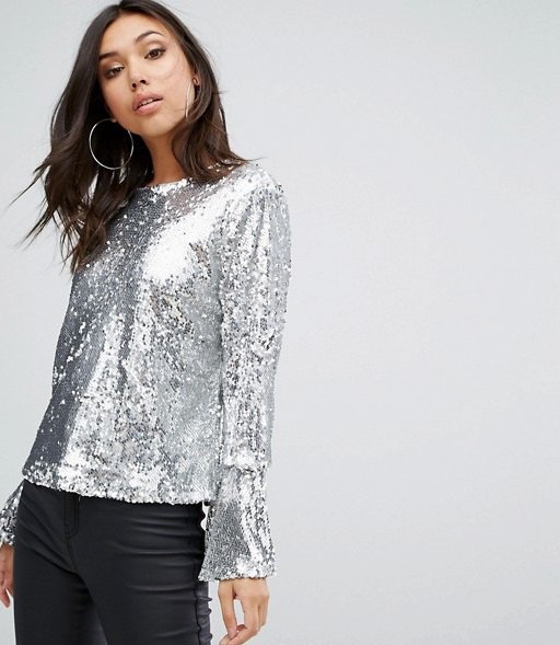 silver colored watch sleeve blouse with black leather pants