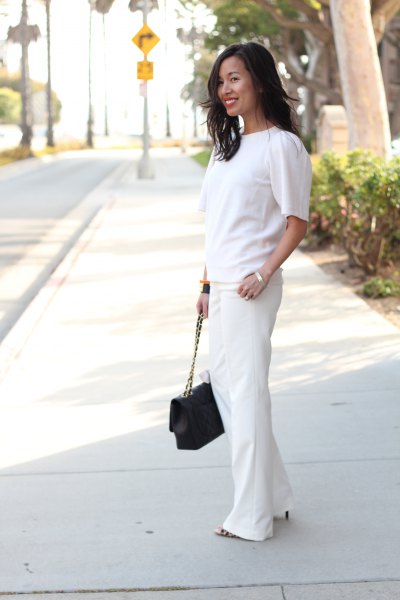 white short-sleeved sweater with wide leg dress pants